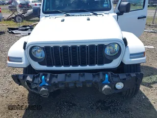2024 Jeep Wrangler Willys z VIN 1C4RJXN60RW225250, wystawiony jako IAAI lot #42333989 z przebiegiem 35 893 mil mil oraz . Historia ofert i sprzedaży dostępna na DreamBid. Obrazek 6.
