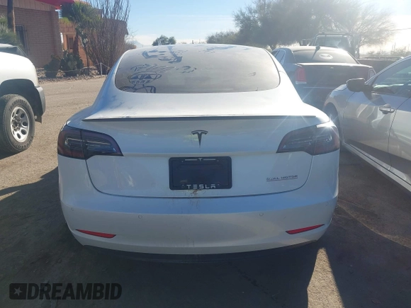 2021 Tesla Model 3 Performance with VIN 5YJ3E1EC6MF926448, listed as a IAAI auction lot 41240309 with 39,386 mi miles and . Bid and sale history available at DreamBid. Image 16.