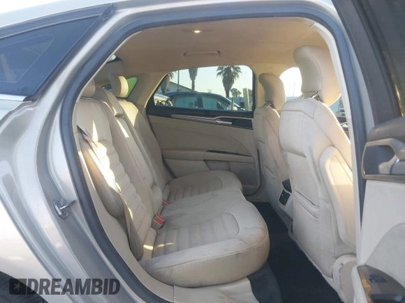 2015 Ford Fusion SE z VIN 3FA6P0H79FR137377, wystawiony jako IAAI lot #41345497 z przebiegiem 170 533 mil mil oraz . Historia ofert i sprzedaży dostępna na DreamBid. Obrazek 8.
