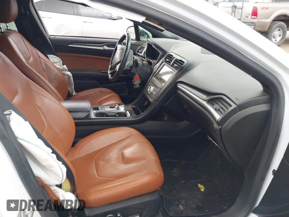 2019 Ford Fusion Titanium with VIN 3FA6P0D93KR138574, listed as a IAAI auction lot 41967094 with 118,297 mi miles. Bid and sale history available at carsss.com. Image 5.