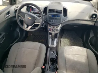 2012 Chevrolet Sonic LS z VIN 1G1JA6SH1C4162605, wystawiony jako Copart lot #88037145 z przebiegiem 117 164 mil mil oraz Nie do naprawy • Non repairable. Historia ofert i sprzedaży dostępna na DreamBid. Obrazek 8.