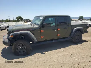 2023 Jeep Gladiator Mojave with VIN 1C6JJTEG9PL559331, listed as a Copart auction lot 62415345 with 22,091 mi miles and Salvage title. Bid and sale history available at DreamBid. Image 1.