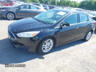 2016 Ford Focus SE with VIN 1FADP3F23GL235708, listed as a IAAI auction lot 42629556 with 139,777 mi miles and . Bid and sale history available at DreamBid. Image 2.