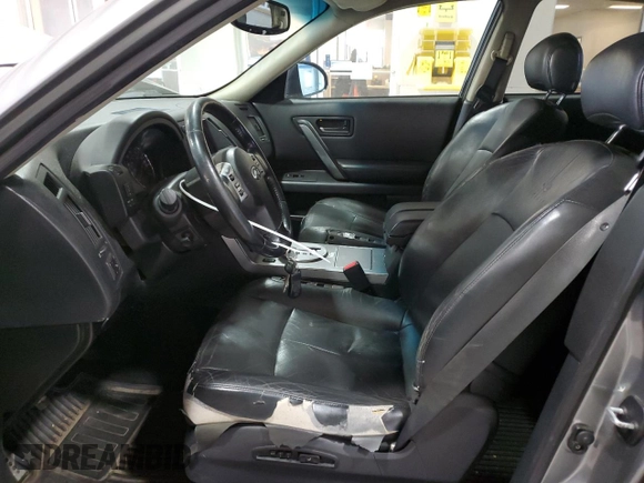 2005 Infiniti FX z VIN JNRAS08W25X200190, wystawiony jako Copart lot #86908434 z przebiegiem 269 591 mil mil oraz Szkoda całkowita • Salvage title. Historia ofert i sprzedaży dostępna na DreamBid. Obrazek 7.