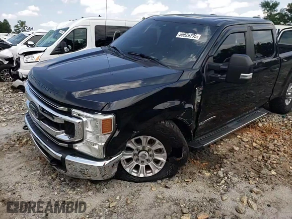 2020 Ford F-250 XL with VIN 1FT8W2BTXLEE30615, listed as a Copart auction lot 60626295 with 142,318 mi miles and Salvage title. Bid and sale history available at DreamBid. Image 13.