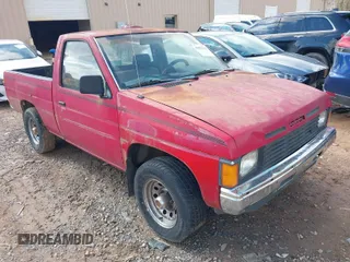 1987 Nissan Hardbody z VIN 1N6ND11S5HC335231, wystawiony jako IAAI lot #41833266 z przebiegiem 199 899 mil mil oraz . Historia ofert i sprzedaży dostępna na DreamBid. Obrazek 1.