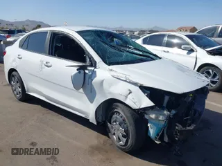 2023 Kia Rio S with VIN 3KPA24AD6PE599186, listed as a IAAI auction lot 41720658 with 30,153 mi miles. Bid and sale history available at carsss.com. Image 1.