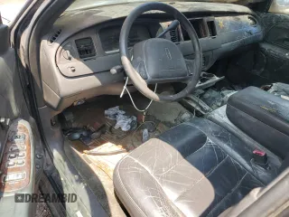 1999 Lincoln Town Car Executive with VIN 1L1FM81W8XY710157, listed as a Copart auction lot 59804965 with Not provided miles and Salvage title. Bid and sale history available at DreamBid. Image 8.
