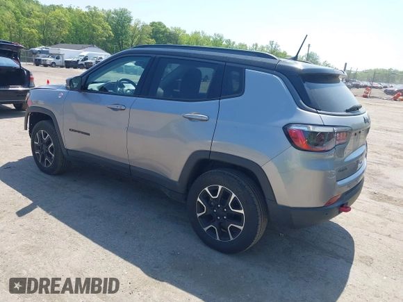 2021 Jeep Compass Trailhawk z VIN 3C4NJDDB7MT590390, wystawiony jako IAAI lot #42163205 z przebiegiem 70 551 mil mil oraz . Historia ofert i sprzedaży dostępna na DreamBid. Obrazek 3.