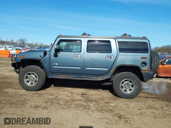 2005 Hummer H2 SUV with VIN 5GRGN23U15H117796, listed as a IAAI auction lot 41543913 with 195,560 mi miles. Bid and sale history available at carsss.com. Image 14.