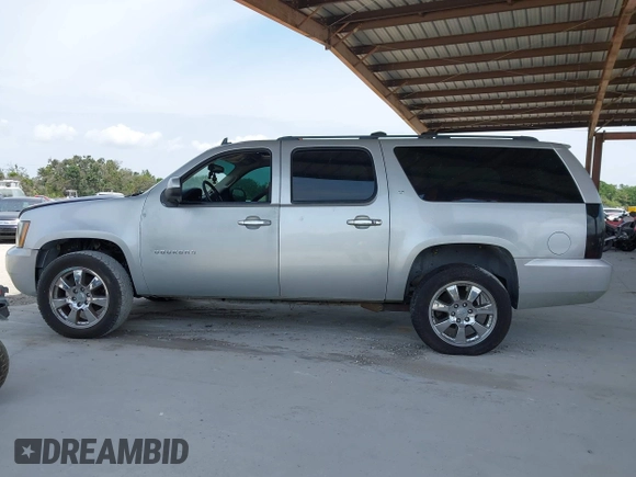 2013 Chevrolet Suburban LT with VIN 1GNSCJE03DR105672, listed as a IAAI auction lot 42197168 with 192,860 mi miles and . Bid and sale history available at DreamBid. Image 14.