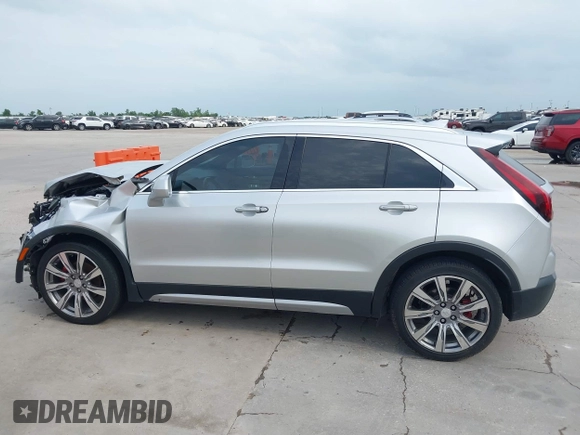 2019 Cadillac XT4 FWD Premium Luxury z VIN 1GYFZCR42KF189610, wystawiony jako IAAI lot #42137690 z przebiegiem 92 502 mil mil oraz . Historia ofert i sprzedaży dostępna na DreamBid. Obrazek 15.