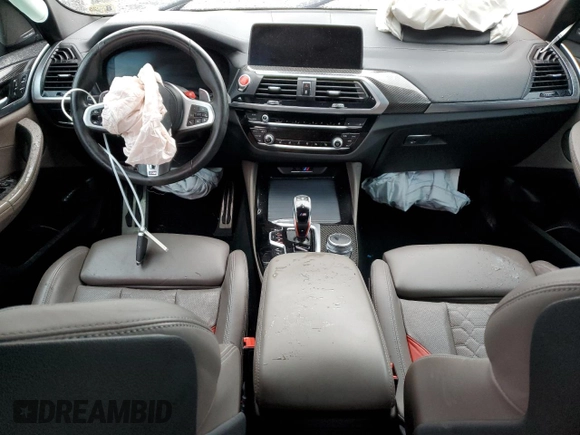 2021 BMW X3 M z VIN 5YMTS0C05M9H64439, wystawiony jako Copart lot #50178655 z przebiegiem Nie podano mil oraz Szkoda całkowita • Salvage title. Historia ofert i sprzedaży dostępna na DreamBid. Obrazek 8.
