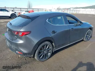 2024 Mazda Mazda3 Hatchback 2.5 S Select Sport with VIN JM1BPAKM1R1712650, listed as a IAAI auction lot 41689439 with 21,937 mi miles. Bid and sale history available at carsss.com. Image 4.