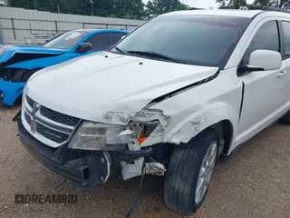 2012 Dodge Journey SXT with VIN 3C4PDCBGXCT150526, listed as a IAAI auction lot 42494115 with 197,863 mi miles and . Bid and sale history available at DreamBid. Image 6.