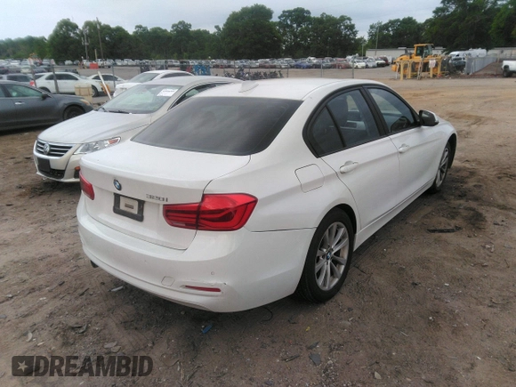 2018 BMW 3 Series 320i with VIN WBA8E1G57JNU91633, listed as a IAAI auction lot 42065119 with 55,062 mi miles. Bid and sale history available at carsss.com. Image 4.