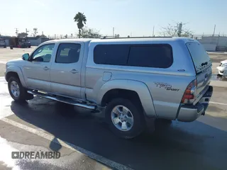 2013 Toyota Tacoma PreRunner with VIN 3TMKU4HN8DM034338, listed as a IAAI auction lot 41808842 with 142,012 mi miles and . Bid and sale history available at DreamBid. Image 3.