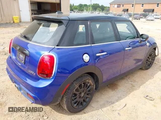 2021 MINI Hardtop 4 Door Cooper S with VIN WMWXU9C00M2N60370, listed as a IAAI auction lot 42426257 with 11,288 mi miles and . Bid and sale history available at DreamBid. Image 4.
