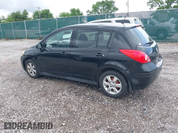 2009 Nissan Versa 1.8 S with VIN 3N1BC13E79L354341, listed as a IAAI auction lot 42079896 with 118,797 mi miles. Bid and sale history available at carsss.com. Image 3.