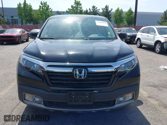 2020 Honda Ridgeline RTL-E with VIN 5FPYK3F70LB009376, listed as a IAAI auction lot 42488529 with 30,932 mi miles and . Bid and sale history available at DreamBid. Image 12.