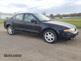 1999 Oldsmobile Alero GL z VIN 1G3NL52E3XC327519, wystawiony jako Copart lot #79273394 z przebiegiem 63 081 mil mil oraz Czysty tytuł • Clean title. Historia ofert i sprzedaży dostępna na DreamBid. Obrazek 4.