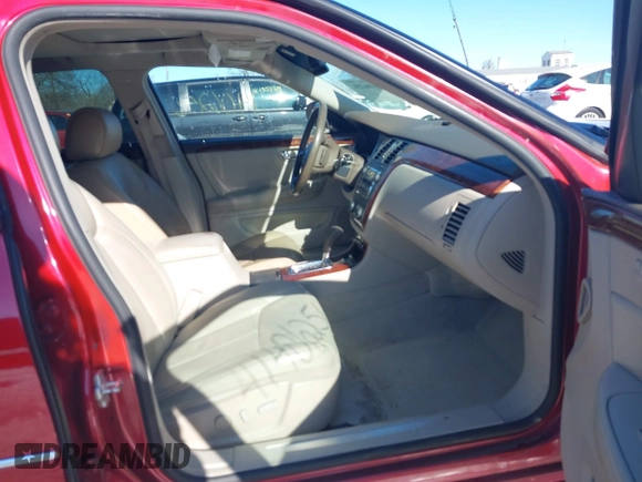 2006 Cadillac DTS w/1SC with VIN 1G6KD57Y06U210141, listed as a IAAI auction lot 41406256 with 184,569 mi miles. Bid and sale history available at carsss.com. Image 5.