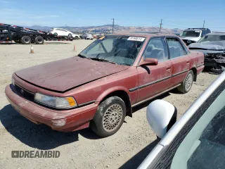 1990 Toyota Camry LE ECT z VIN JT2SV22E0L0351440, wystawiony jako Copart lot #70768614 z przebiegiem 176 239 mil mil oraz Szkoda całkowita • Salvage title. Historia ofert i sprzedaży dostępna na DreamBid. Obrazek 1.
