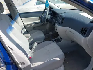 2006 Hyundai Accent GLS with VIN KMHCN46C86U055221, listed as a IAAI auction lot 42028714 with 1 mi miles. Bid and sale history available at carsss.com. Image 5.