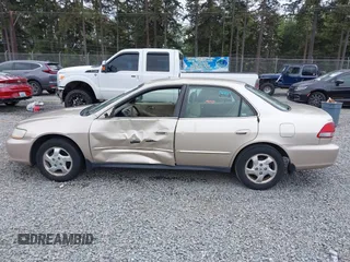 2001 Honda Accord LX z VIN JHMCG56471C028960, wystawiony jako IAAI lot #42223734 z przebiegiem 387 033 mil mil oraz . Historia ofert i sprzedaży dostępna na DreamBid. Obrazek 15.
