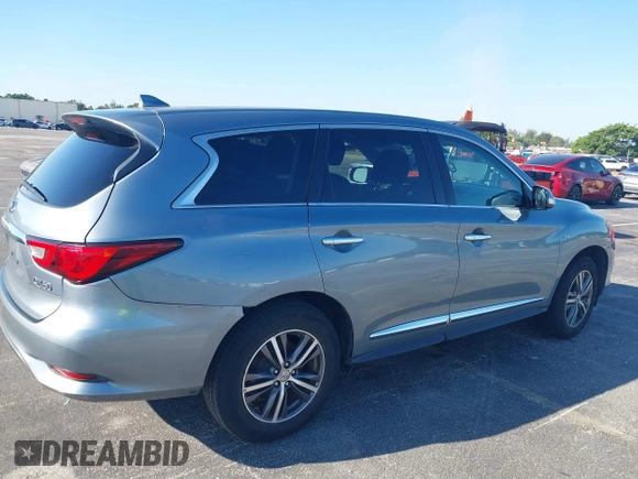 2016 Infiniti QX60 with VIN 5N1AL0MN8GC501966, listed as a IAAI auction lot 41789987 with 147,358 mi miles and . Bid and sale history available at DreamBid. Image 6.