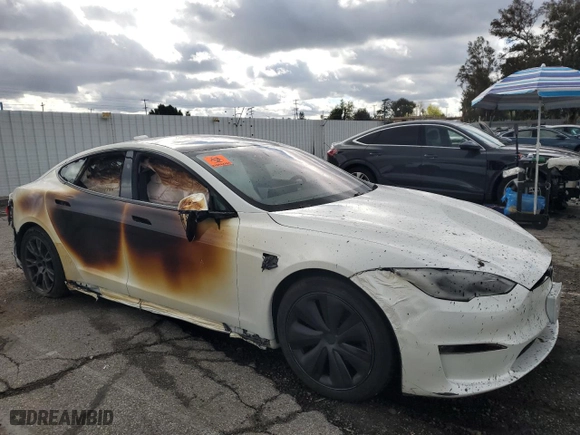 2023 Tesla Model S with VIN 5YJSA1E56PF511207, listed as a Copart auction lot 89173355 with 7,152 mi miles and Salvage Title. Bid and sale history available at carsss.com. Image 4.