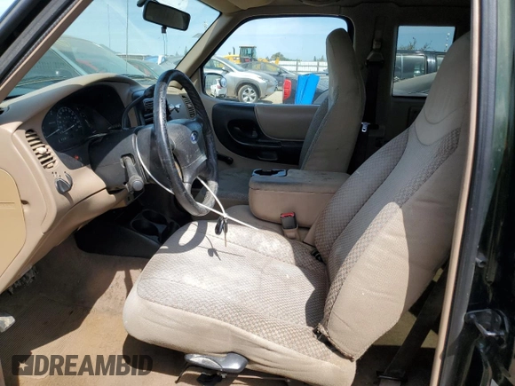 2001 Ford Ranger XL z VIN 1FTYR14V21PB49944, wystawiony jako Copart lot #54184925 z przebiegiem 305 117 mil mil oraz Szkoda całkowita • Salvage title. Historia ofert i sprzedaży dostępna na DreamBid. Obrazek 7.
