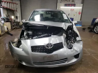 2007 Toyota Yaris with VIN JTDJT923275114473, listed as a Copart auction lot 52242355 with 137,963 mi miles and Salvage Title. Bid and sale history available at carsss.com. Image 5.
