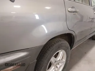 2000 Lexus RX 300 z VIN JT6HF10U6Y0129714, wystawiony jako IAAI lot #41641164 z przebiegiem 174 537 mil mil oraz . Historia ofert i sprzedaży dostępna na DreamBid. Obrazek 12.