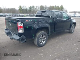 2019 Chevrolet Colorado 4WD Z71 z VIN 1GCGTDEN6K1181460, wystawiony jako IAAI lot #41815027 z przebiegiem 103 283 mil mil oraz . Historia ofert i sprzedaży dostępna na DreamBid. Obrazek 4.