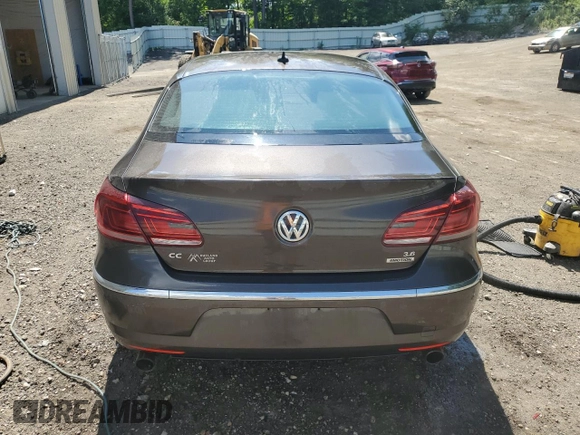 2014 Volkswagen CC VR6 Executive 4Motion with VIN WVWGU7AN3EE539874, listed as a Copart auction lot 61742974 with 124,358 mi miles and Salvage Title. Bid and sale history available at carsss.com. Image 6.
