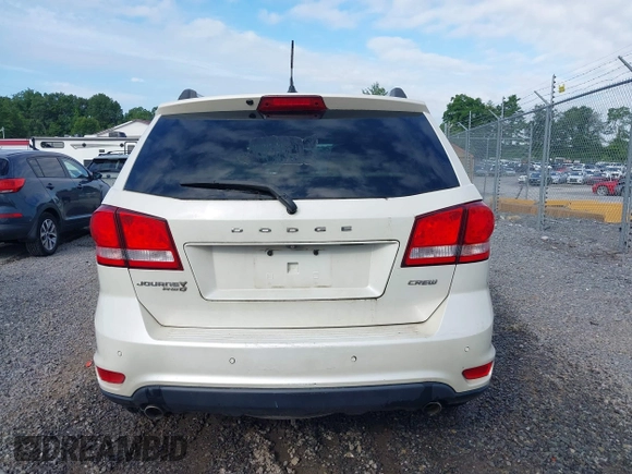 2013 Dodge Journey Crew with VIN 3C4PDDDG9DT685464, listed as a IAAI auction lot 42641982 with 155,901 mi miles and . Bid and sale history available at DreamBid. Image 16.
