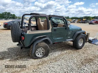 1999 Jeep Wrangler Sport with VIN 1J4FY19S0XP402688, listed as a Copart auction lot 58968125 with 211,910 mi miles and Salvage title. Bid and sale history available at DreamBid. Image 3.