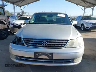 2003 Toyota Avalon XL z VIN 4T1BF28B03U321618, wystawiony jako IAAI lot #42297842 z przebiegiem 142 154 mil mil oraz . Historia ofert i sprzedaży dostępna na DreamBid. Obrazek 13.