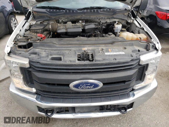 2017 Ford F-250 XL with VIN 1FTBF2A64HEE26438, listed as a Copart auction lot 45762404 with 133,077 mi miles and Salvage title. Bid and sale history available at DreamBid. Image 11.