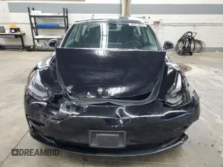 2023 Tesla Model 3 with VIN 5YJ3E1EA5PF439017, listed as a Copart auction lot 53694145 with 73,875 mi miles and Salvage Title. Bid and sale history available at DreamBid. Image 5.