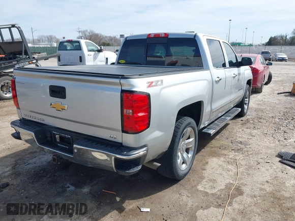 2015 Chevrolet Silverado 1500 LTZ with VIN 3GCUKSEC3FG522605, listed as a IAAI auction lot 41798226 with 156,541 mi miles and . Bid and sale history available at DreamBid. Image 4.