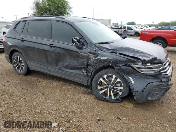 2023 Volkswagen Tiguan S with VIN 3VVRB7AX0PM038326, listed as a Copart auction lot 56350825 with 50,013 mi miles and Salvage title. Bid and sale history available at DreamBid. Image 4.