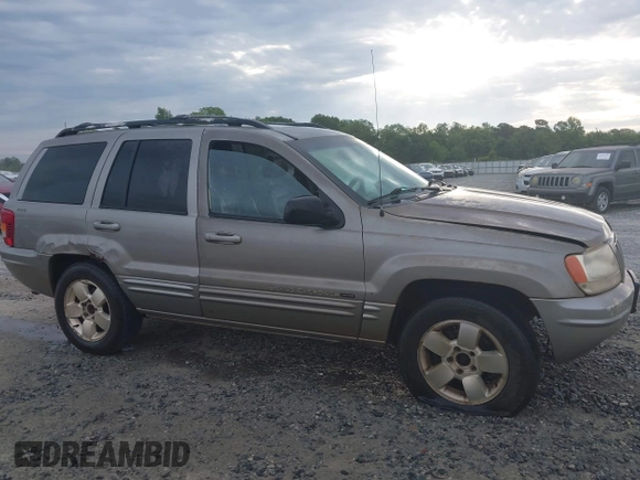 2001 Jeep Grand Cherokee Limited with VIN 1J4GW58N31C510766, listed as a IAAI auction lot 42107607 with 305,893 mi miles and . Bid and sale history available at DreamBid. Image 6.