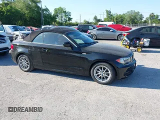 2011 BMW 1 Series 128i with VIN WBAUL7C55BVM81049, listed as a IAAI auction lot 41892811 with 50,659 mi miles and . Bid and sale history available at carsss.com. Image 1.