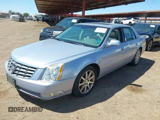 2006 Cadillac DTS w/1SE with VIN 1G6KD57956U188369, listed as a IAAI auction lot 41837341 with 115,417 mi miles. Bid and sale history available at carsss.com. Image 2.