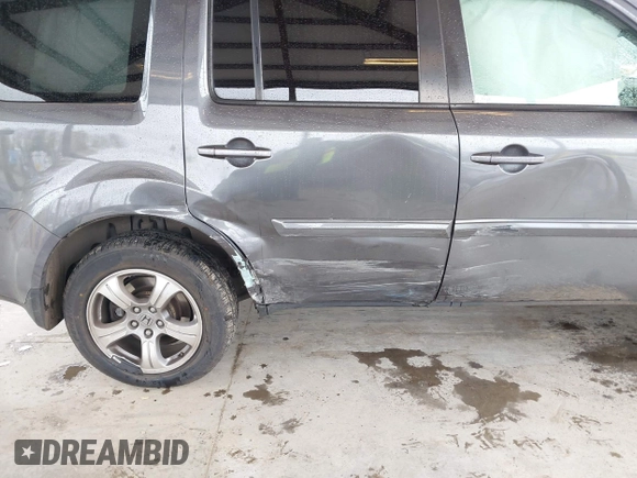 2015 Honda Pilot EX-L with VIN 5FNYF4H50FB030652, listed as a IAAI auction lot 41937401 with 91,429 mi miles and . Bid and sale history available at carsss.com. Image 6.
