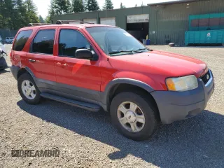 2002 Ford Escape XLT Choice with VIN 1FMCU04122KB12659, listed as a Copart auction lot 63816155 with 256,536 mi miles and Salvage title. Bid and sale history available at DreamBid. Image 4.