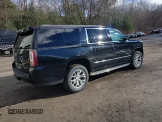 2015 GMC Yukon XL SLT with VIN 1GKS2HKC9FR159164, listed as a IAAI auction lot 41235420 with 136,730 mi miles. Bid and sale history available at carsss.com. Image 4.