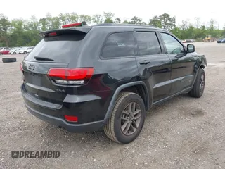 2016 Jeep Grand Cherokee Laredo z VIN 1C4RJFAG6GC475857, wystawiony jako IAAI lot #42311448 z przebiegiem 106 472 mil mil oraz . Historia ofert i sprzedaży dostępna na DreamBid. Obrazek 4.